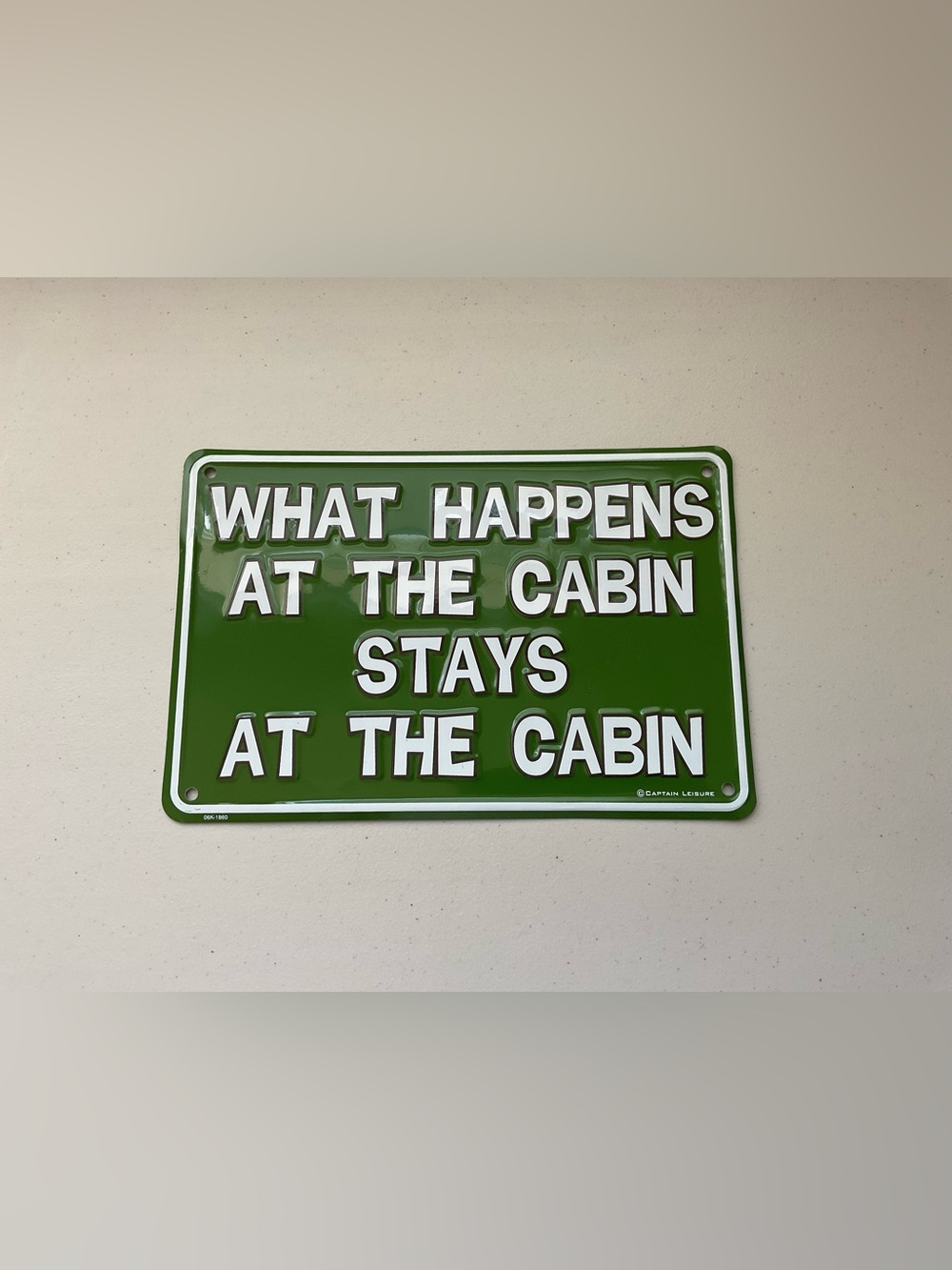 Green "What Happens at the Cabin Stays at the Cabin" Metal Sign - Cabin Decor